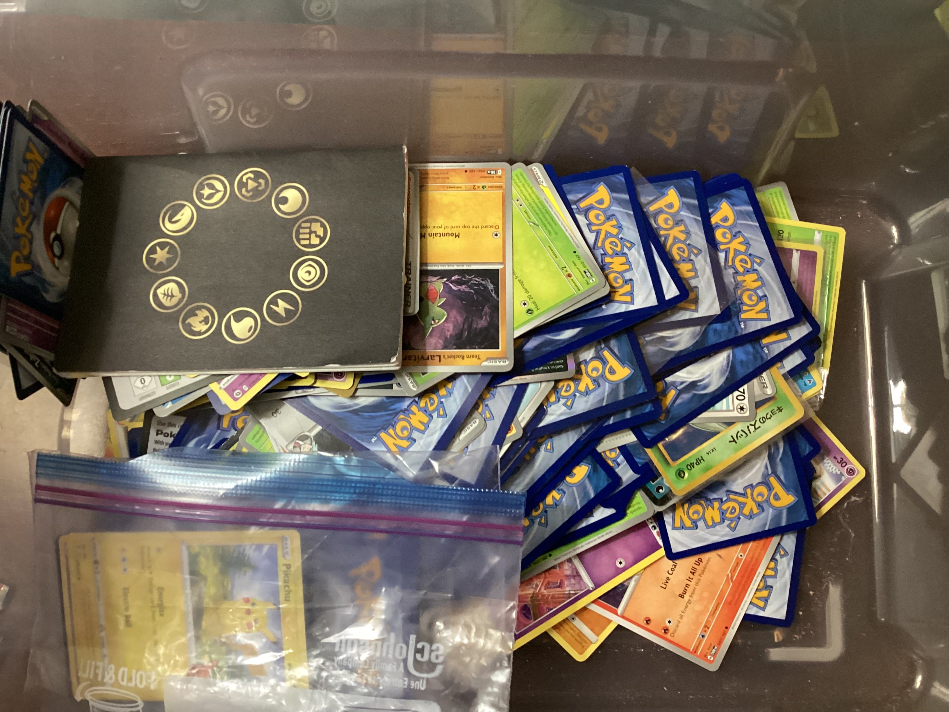 Box full of random Pokémon cards